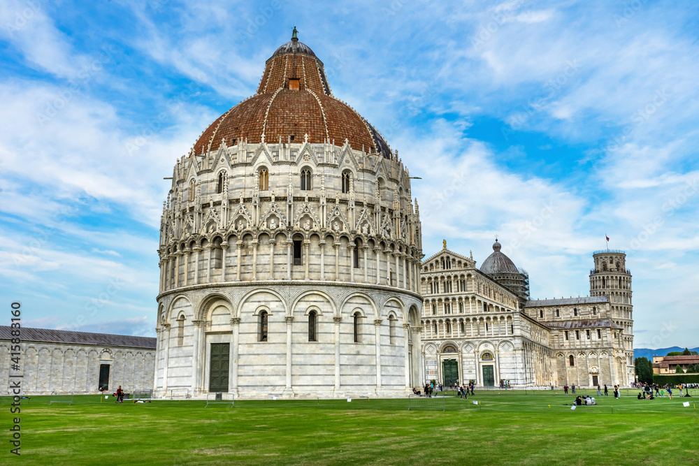 Pisa Baptistery of St. John and Leaning Tower of Pisa, Tuscany Italy. Completed in 1300's.