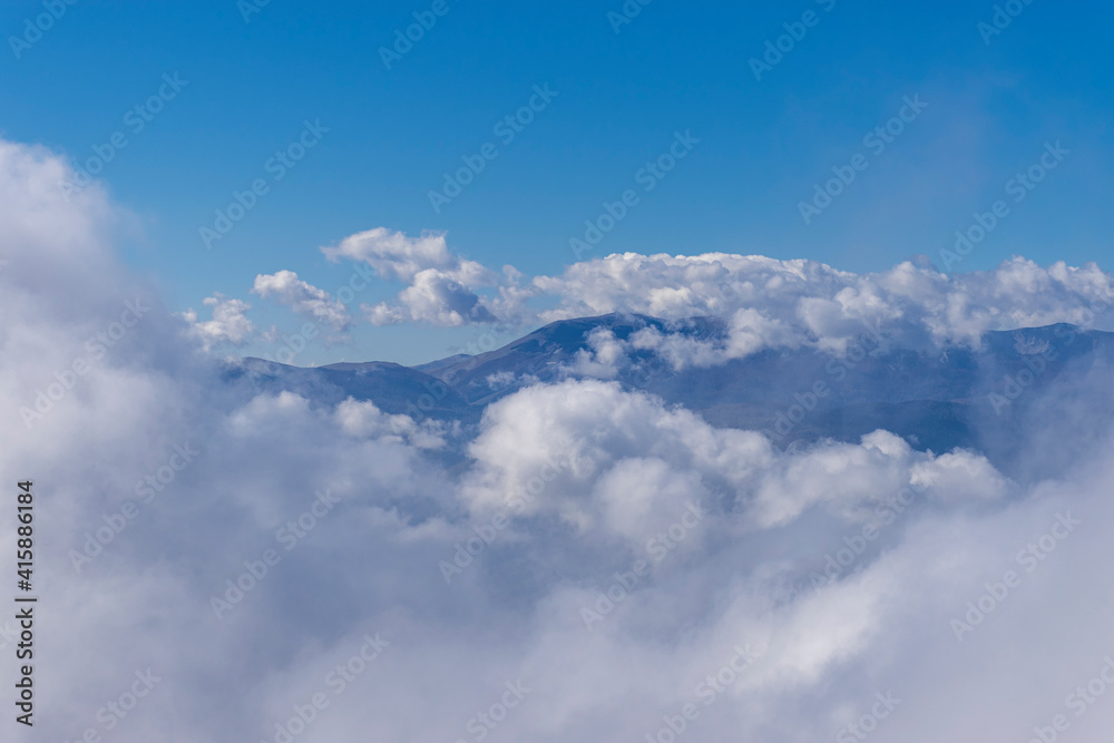 Fototapeta premium clouds over the mountains