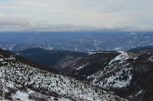 winter landscape of mountains and hills in the snow