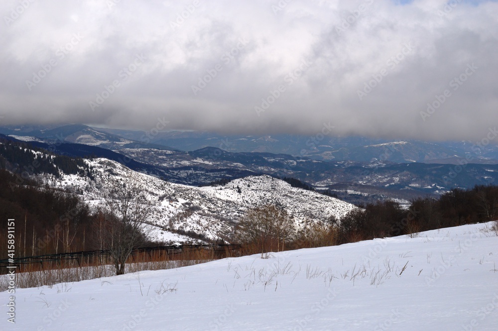 winter landscape of mountains and hills in the snow