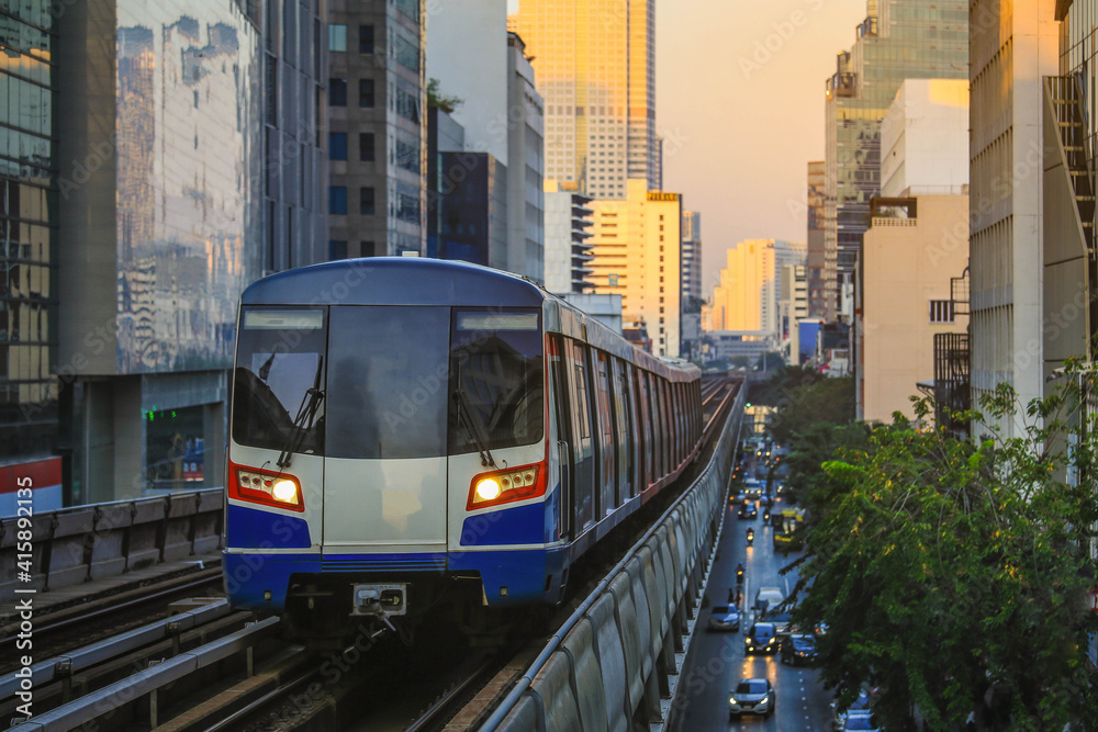 Naklejka premium BTS Sky Train is running in downtown of Bangkok. Sky train is fastest transport mode in Bangkok
