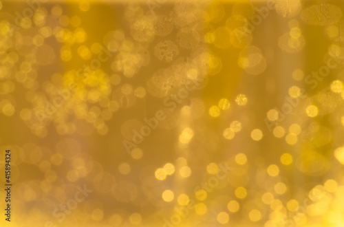 Canvas Print Yellow gold sparkly background with bokeh