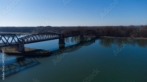 Bridge at summer with a blue sky in the Horizon . The picture was taken by a drone. the River unter the Bridge called Rhein.   © Yannick