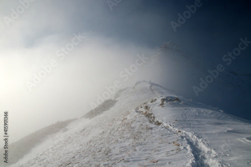 Czerwone Wierchy - Red Peaks above clouds, mountain range in Western Tatras, Poland 