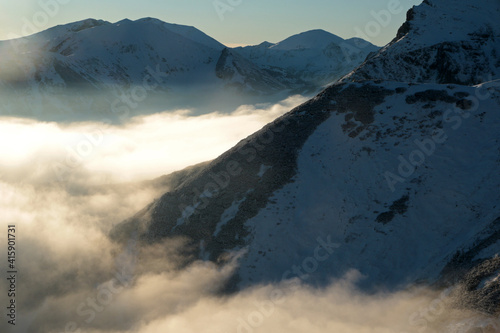 Czerwone Wierchy - Red Peaks above clouds, mountain range in Western Tatras, Poland 