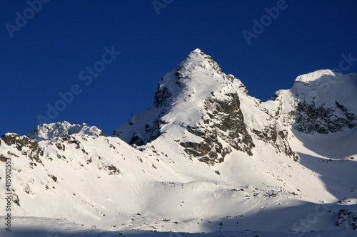 Koscielec peak, view from Hala Gasienicowa in winter, Tatra Mountains, Poland photo