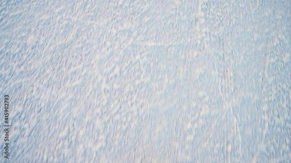 Point of view panning looking down walking above view of texture of Bonneville salt flats with wet salt on ground abstract with person's feet Point of view panning looking down walking above view of texture of Bonneville salt flats with wet salt on ground abstract with person's feet