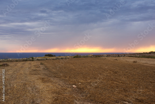 Rain during sunset  Gozo. 