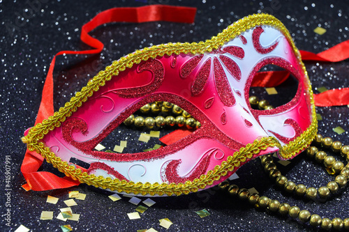 Red Carnival Mask With Gold Beads And Confetti