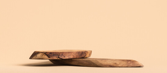 Background for products cosmetics, food or jewellery. Rustic wood pieces podium. Front view.