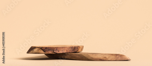 Background for products cosmetics, food or jewellery. Rustic wood pieces podium. Front view.