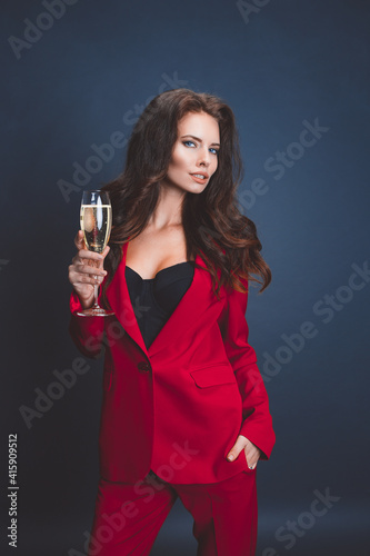beautiful young girl with glass of champagne.