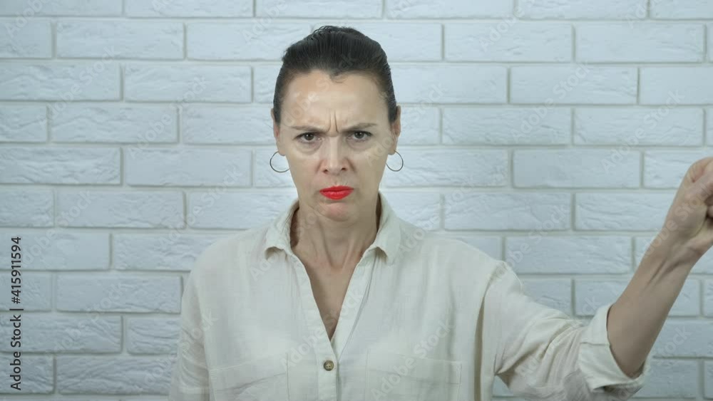 Fight for woman's life. Serious woman in the fight for women's rights.