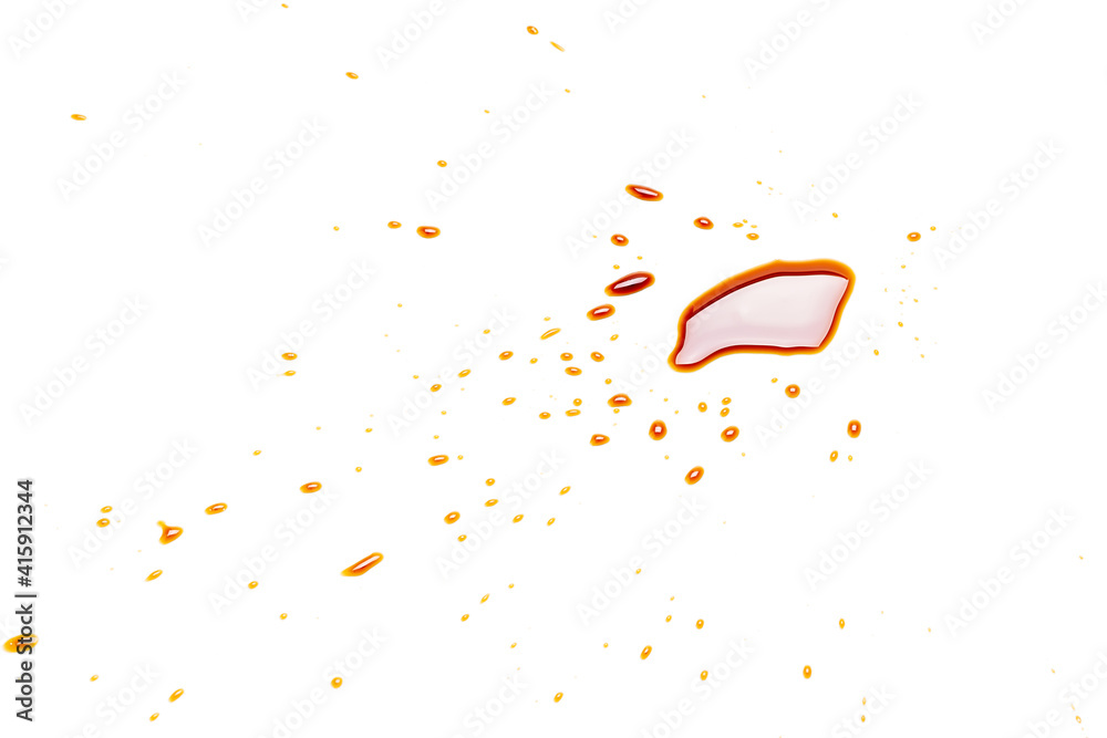 Fototapeta premium soy sauce drip isolated on a white background. soya sauce swirl cut out. above view. studio shot