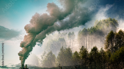 factory smoke covering green forest double exposure global warming climate change photo