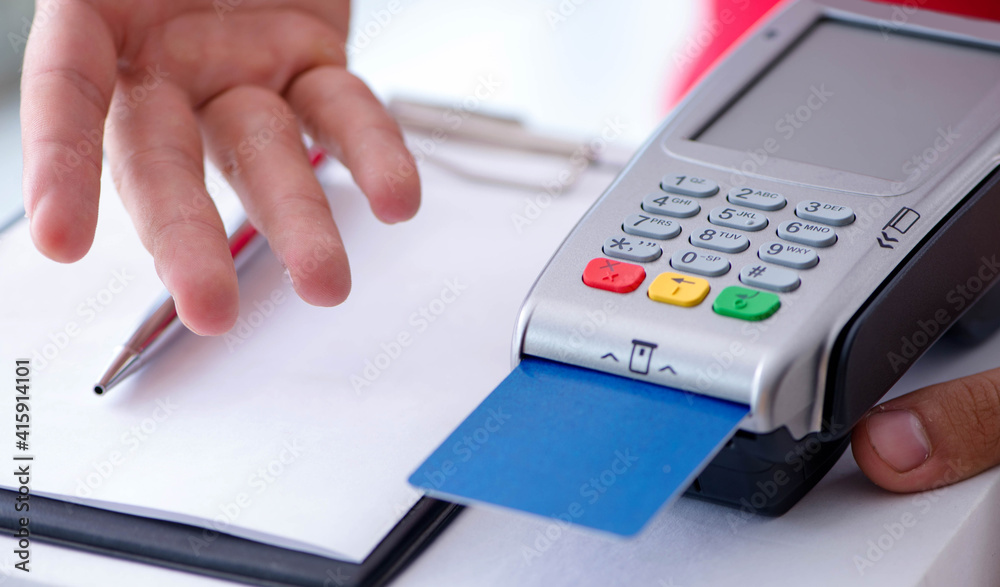 Pizza delivery being paid with pos and credit card Pizza delivery being paid with pos and credit card