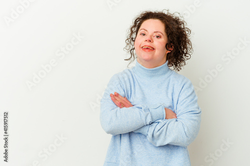 Woman with Down syndrome isolated smiling confident with crossed arms. photo