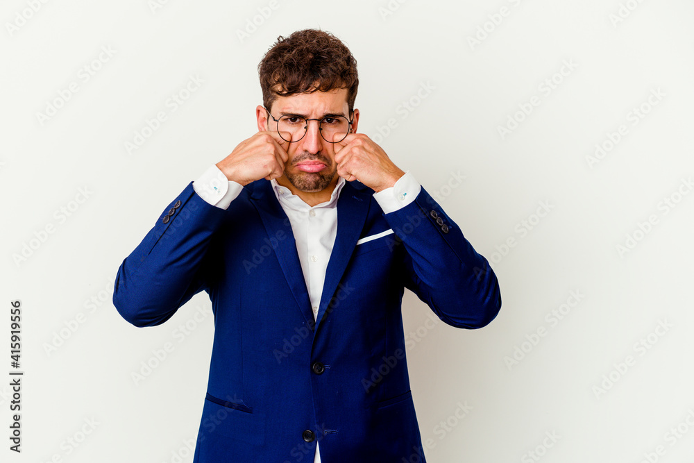 Young business caucasian man isolated on white background whining and crying disconsolately. Young business caucasian man isolated on white background whining and crying disconsolately.
