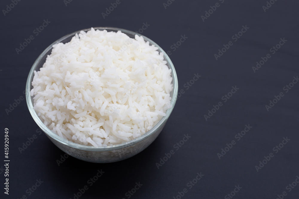 Dish of rice on white background.