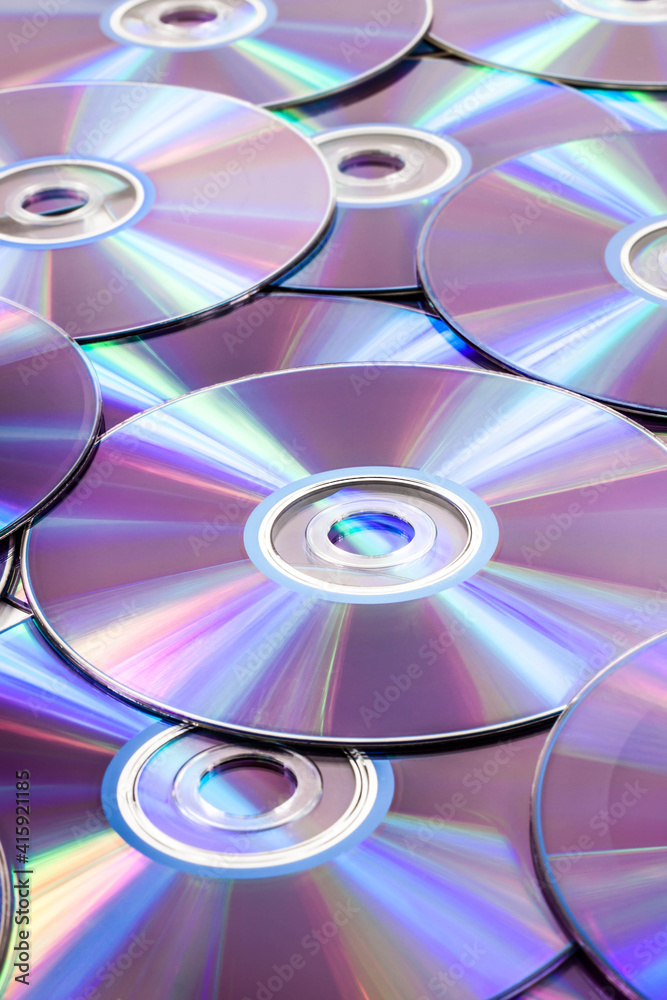 Old technology, waste compact disc collection decoration for pattern. cd background concept. high angle, full frame Old technology, waste compact disc collection decoration for pattern. cd background concept. high angle, full frame