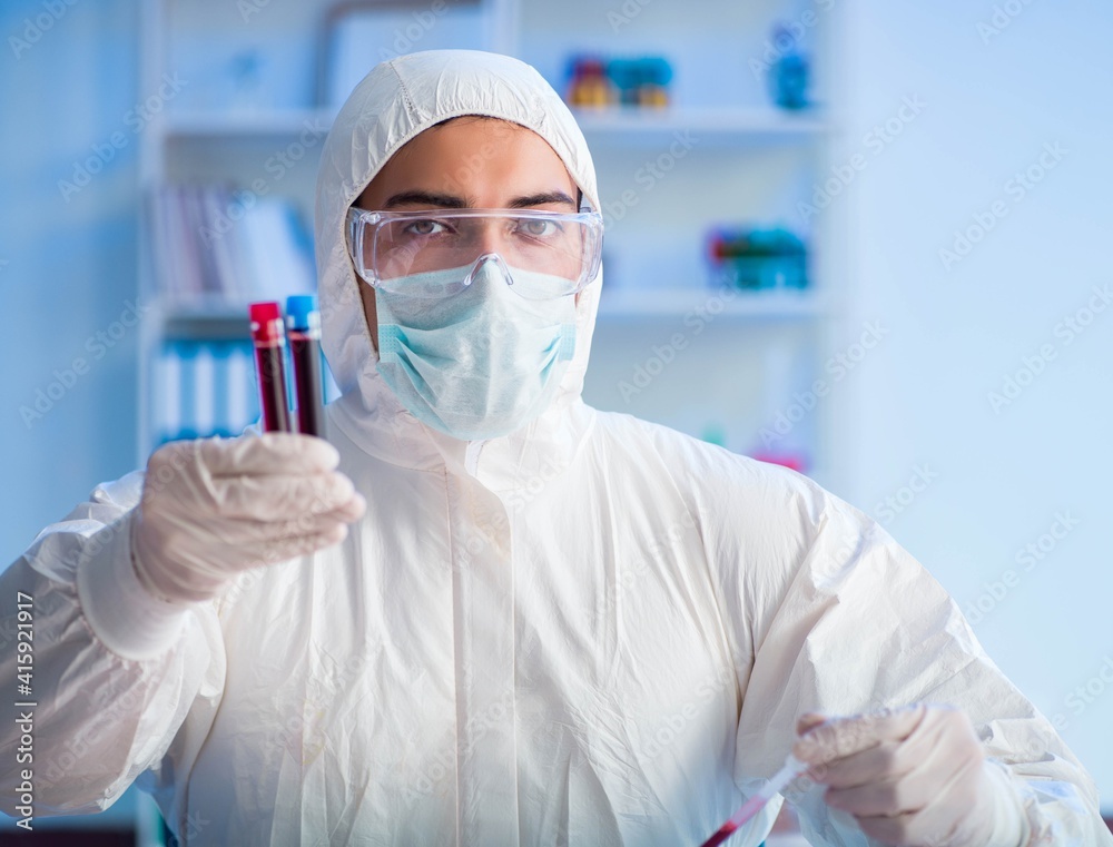 Lab assistant testing blood samples in hospital Lab assistant testing blood samples in hospital