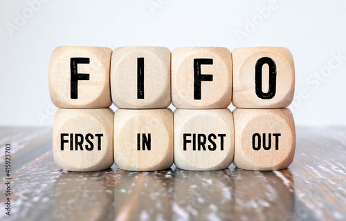 Alphabet letter block in word FIFO photo