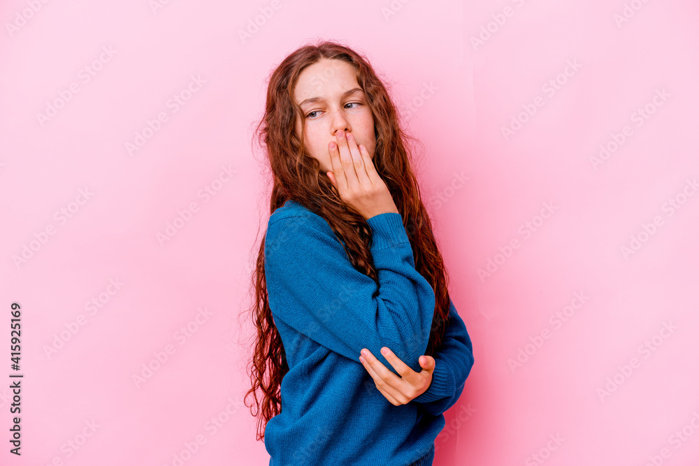 Little caucasian girl isolated on pink background yawning showing a tired gesture covering mouth with hand. Little caucasian girl isolated on pink background yawning showing a tired gesture covering mouth with hand.