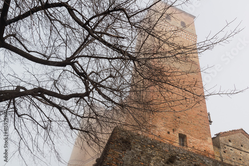 Castle tower covered with fog