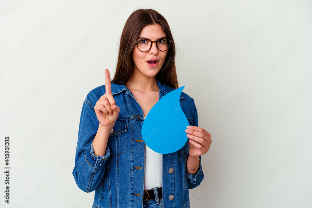 Young caucasian woman celebrating world water day isolated on pink background cheerful and confident showing ok gesture. Young caucasian woman celebrating world water day isolated on pink background cheerful and confident showing ok gesture.