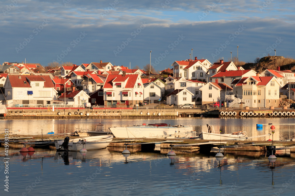 Sweden, Bohuslan, Island of Tjorn. Views over Skarhamn fishing village's rooftops, town and harbor. Sweden, Bohuslan, Island of Tjorn. Views over Skarhamn fishing village's rooftops, town and harbor.