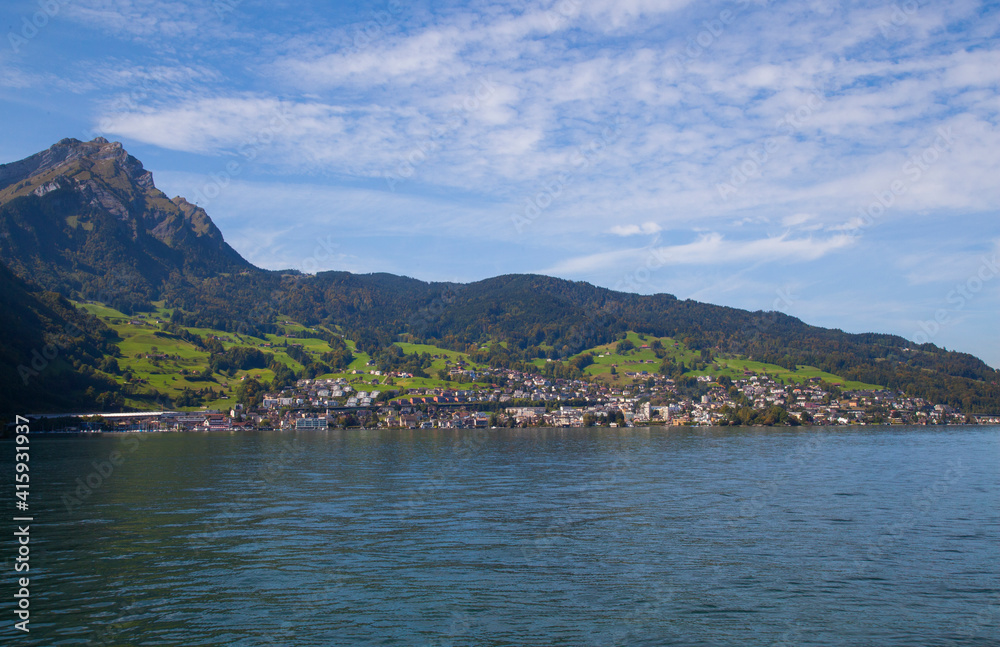 Lake Lucerne, Switzerland. Sailboat sailing on lake. Lake Lucerne, Switzerland. Sailboat sailing on lake.