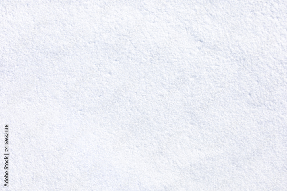 Obraz premium Soft and pure white snow cover the floor in winter, season texture background. Abstract freeze ice detail. Seasonal surface concept.