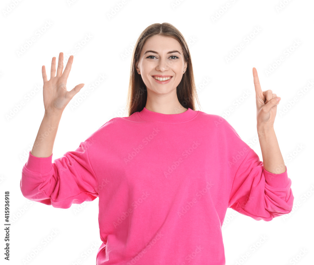 Woman showing number six with her hands on white background Woman showing number six with her hands on white background