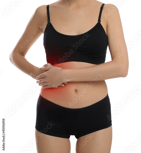 Woman suffering from liver pain on white background, closeup © New Africa
