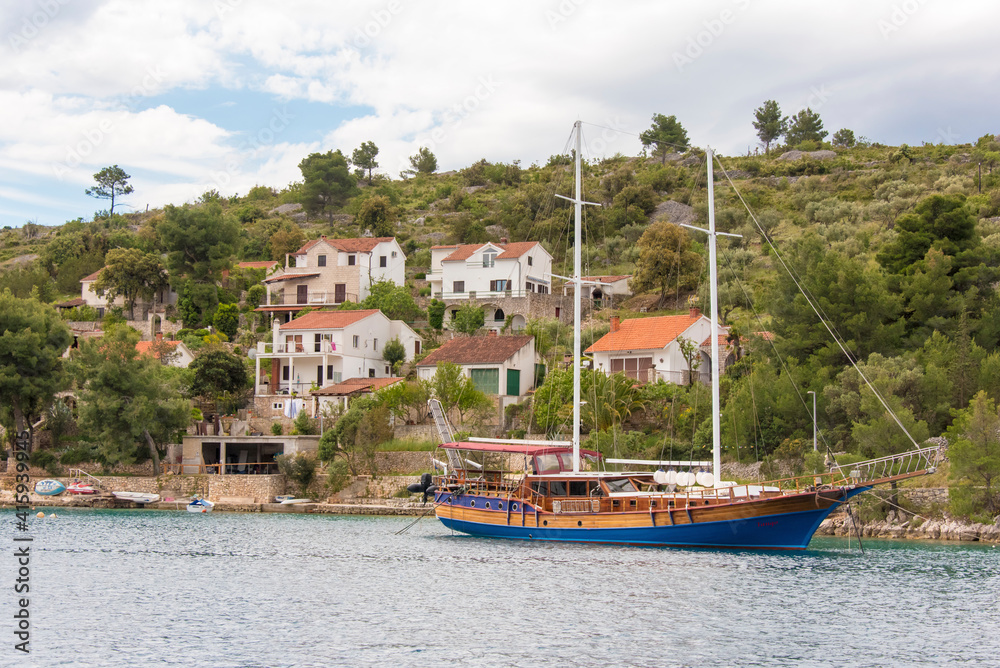 Croatia, Brac, Bobovisca. Tour boat at anchor.