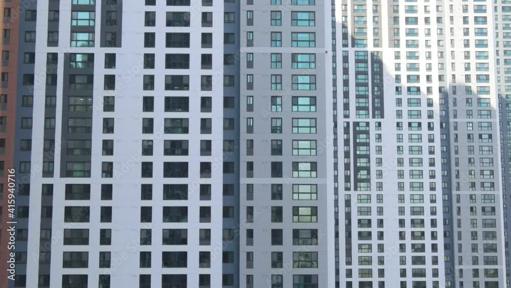 The modern residential complex close-up front view, urban geometry The modern residential complex close-up front view, urban geometry