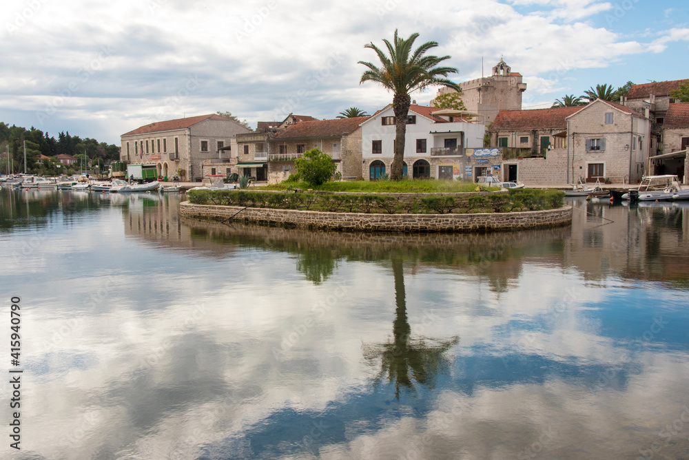 Croatia, Hvar Island, Vrboska. Known as Little Venice. Vrboska center with St. Mary's Church behind. Croatia, Hvar Island, Vrboska. Known as Little Venice. Vrboska center with St. Mary's Church behind.