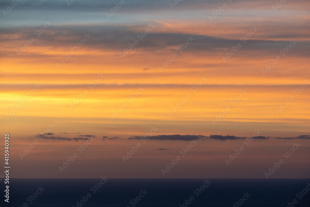 View of sunset clouds over Tasman sea