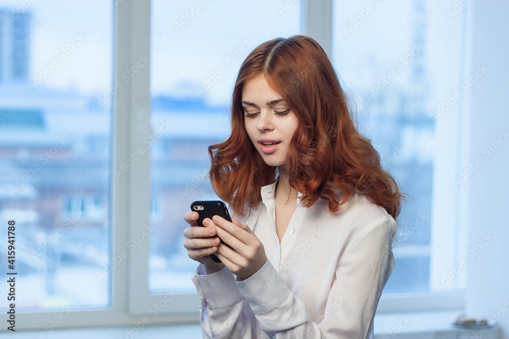 Business woman with phone in hands Office professional work technology Business woman with phone in hands Office professional work technology