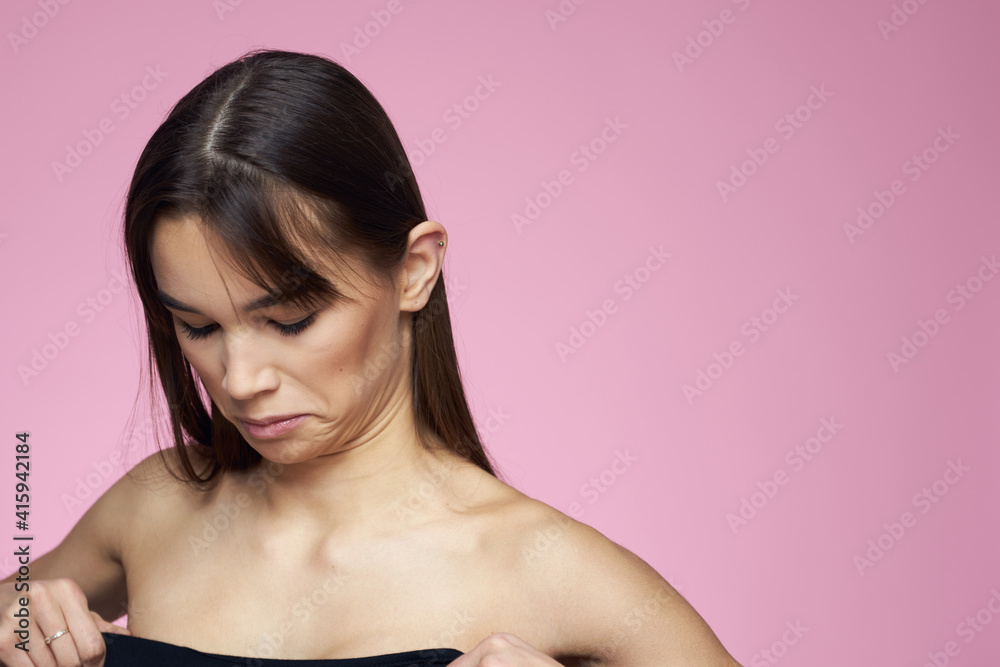 Obraz premium woman with bare shoulders clear skin body care pink background