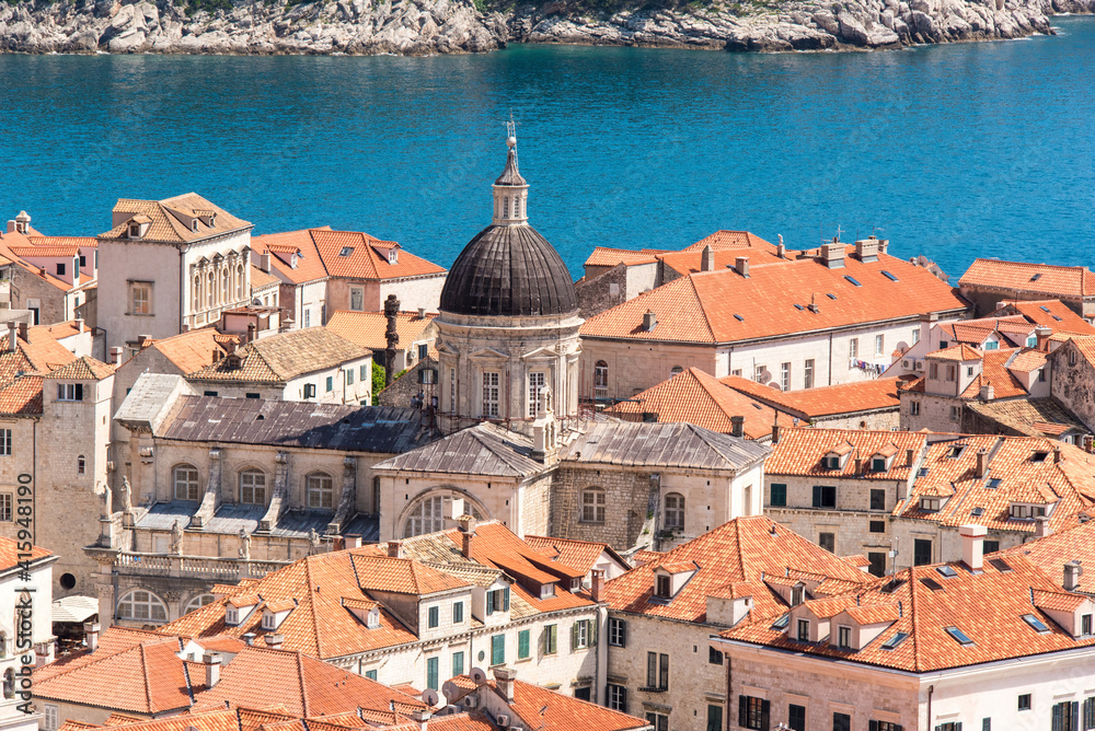 Croatia, Dubrovnik. Old City Cathedral, red tile roofs and Adriatic.