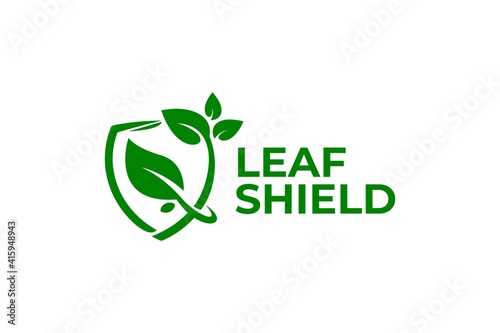 illustration of shield and leaf. nature logo vector.