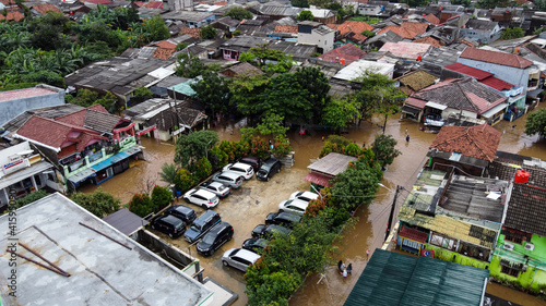 Aerial POV view Depiction of flooding. devastation wrought after massive natural disasters. BEKASI, WEST JAVA, INDONESIA. FEBRUARY 23, 2021