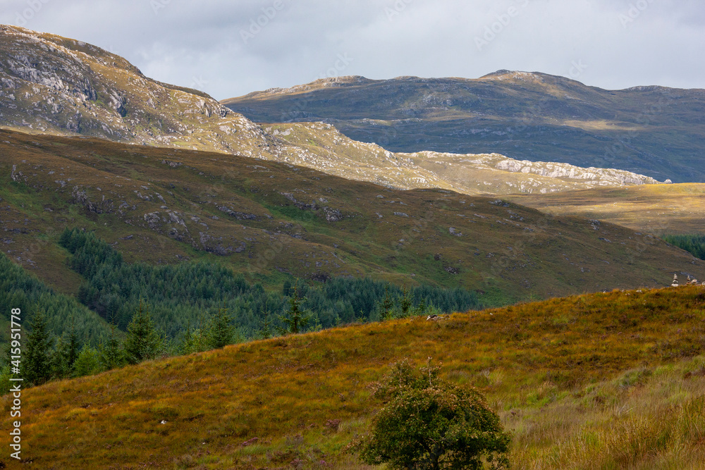 Enroute from Inverness to Isle of Skye in the Scottish Highlands, one finds these beautiful rolling hills.