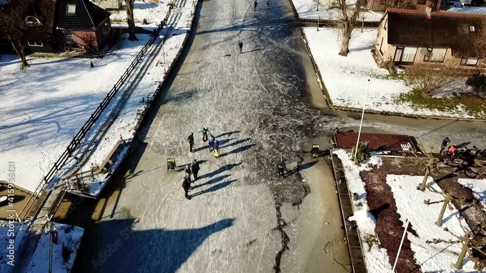 Ice skating in National park ‘de weerribben’, Overijssel, the Netherlands
Panning up shot across a canal in Kalenberg. Ice skating in National park ‘de weerribben’, Overijssel, the Netherlands
Panning up shot across a canal in Kalenberg.