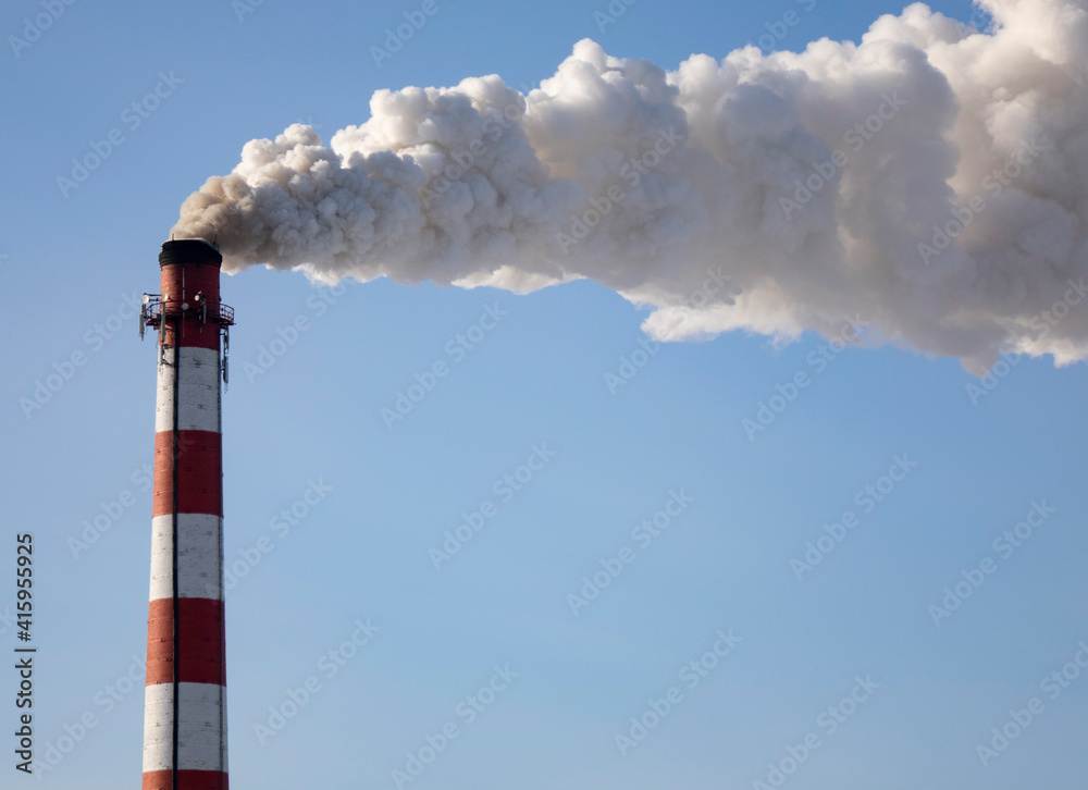 Smoke from the factory chimney. The concept of environmental protection Smoke from the factory chimney. The concept of environmental protection
