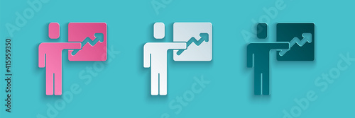 Paper cut Leader of a team of executives icon isolated on blue background. Paper art style. Vector.