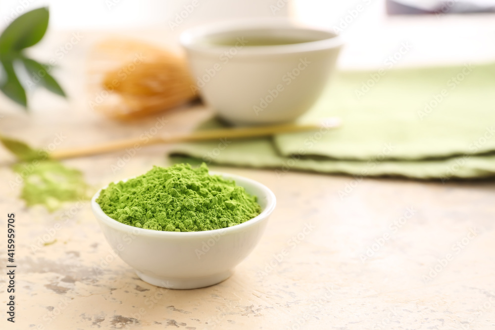 Bowl with powdered matcha tea on table Bowl with powdered matcha tea on table