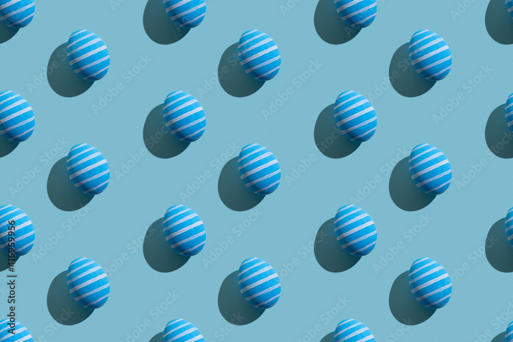 Easter seamless pattern. Festive decor. Holiday art. Abstract background. Blue painted paschal eggs with white lines ornament isolated on pastel textured. Easter seamless pattern. Festive decor. Holiday art. Abstract background. Blue painted paschal eggs with white lines ornament isolated on pastel textured.