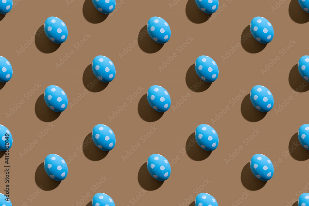 Easter seamless pattern. Festive banner. Holiday design. Cute art. Abstract background. Blue eggs with white spotted ornament isolated on beige.